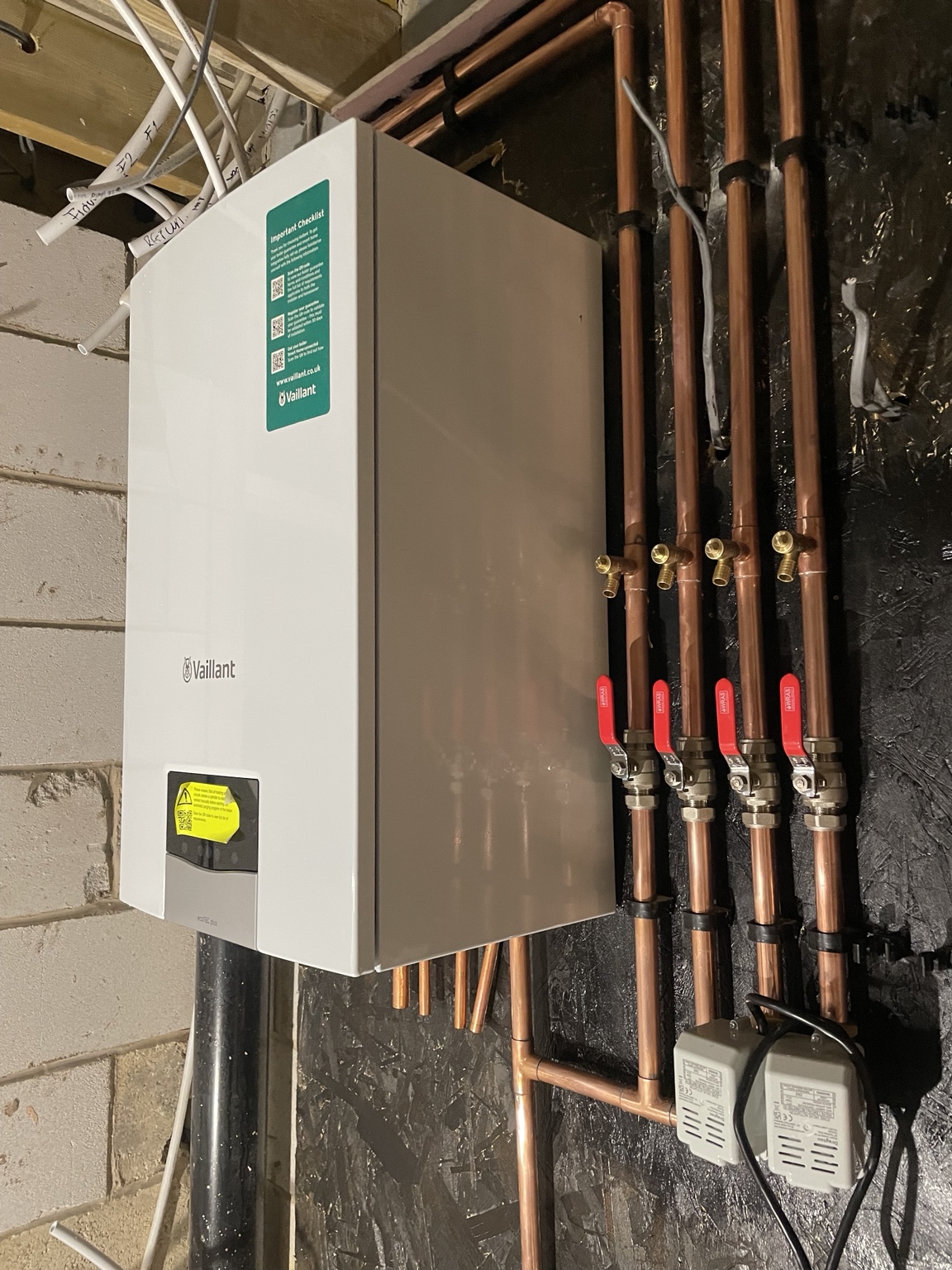 Vaillant boiler and copper pipework installation